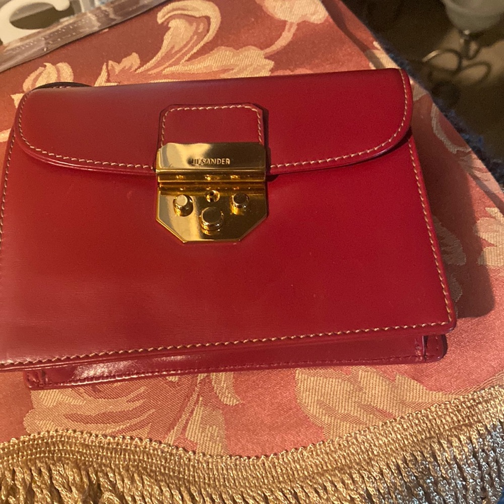 Crossbody Bag with gold hardware.